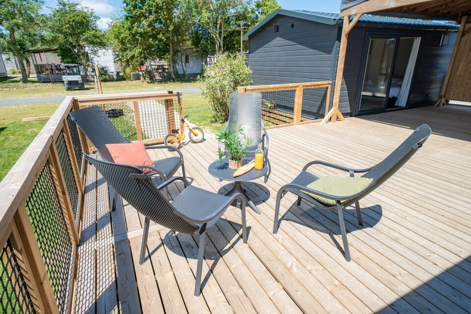 Cottage 8 personnes et sa grande terrasse au camping Portland