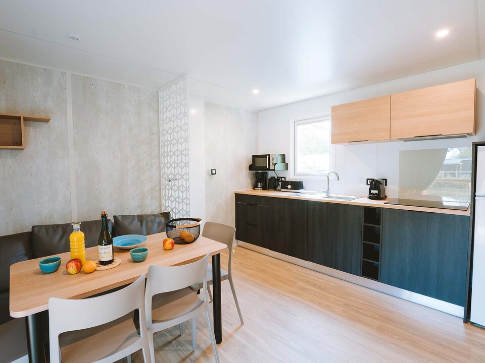 Le séjour d’un cottage Premium, camping Portland
